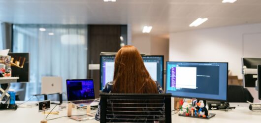 enterprise AI software engineers office computer screens