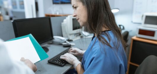 hospital operations center clinical staff computer monitors
