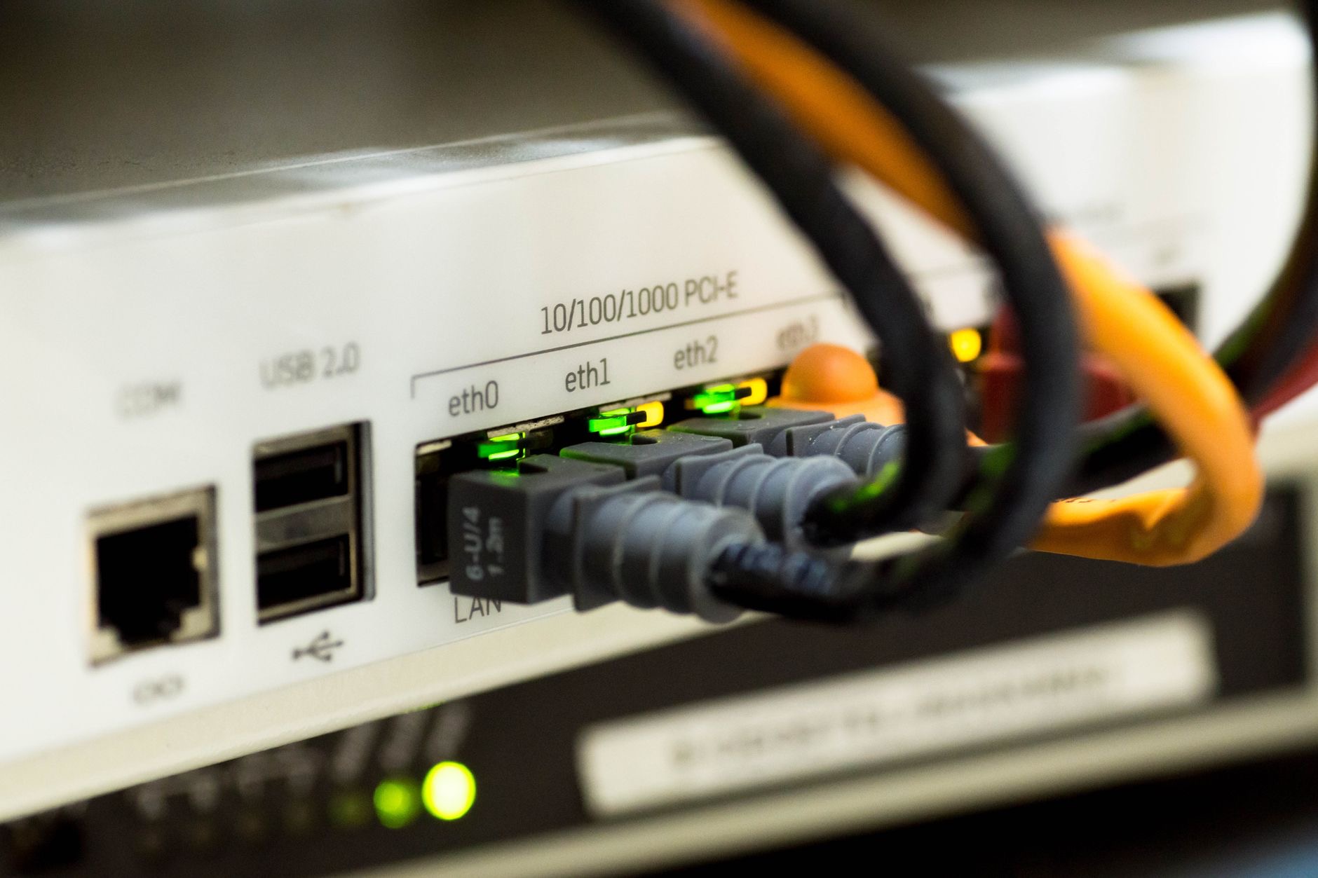 Network switch ports and Ethernet cables in enterprise infrastructure